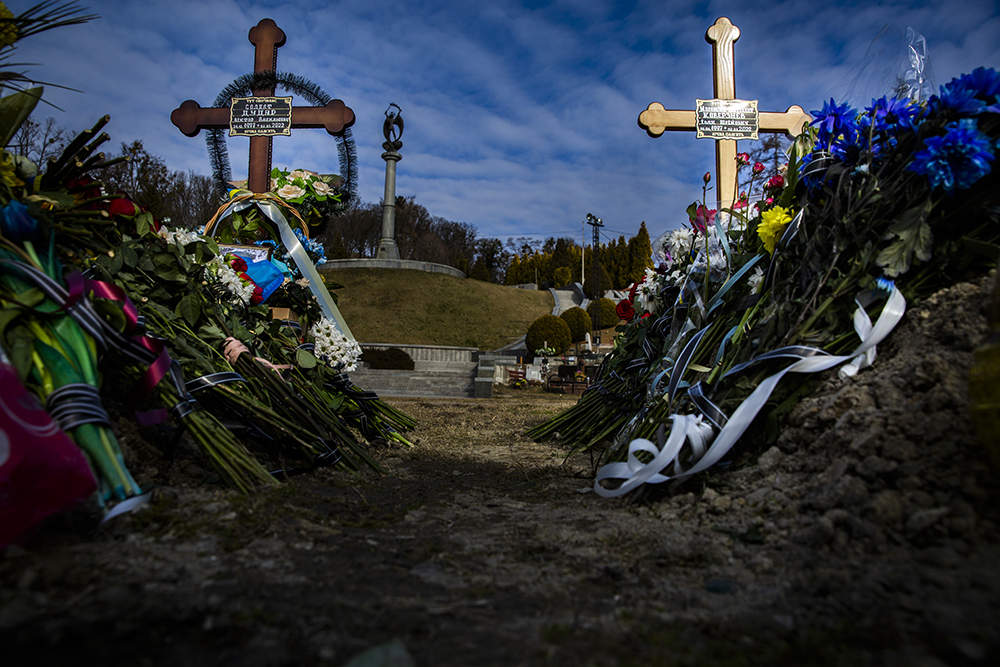 Graves of recently killed Ukrainian soldiers at Lviv