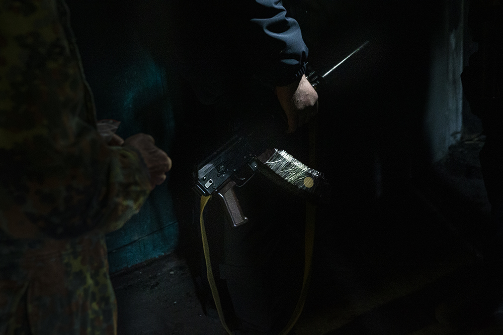 Police officer holding his rifle in Kharkiv ,Ukraine