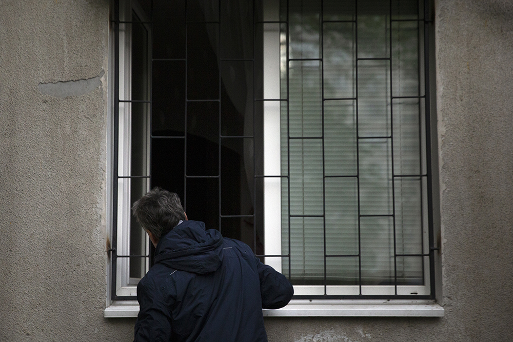 Man searching for neighbor after shelling