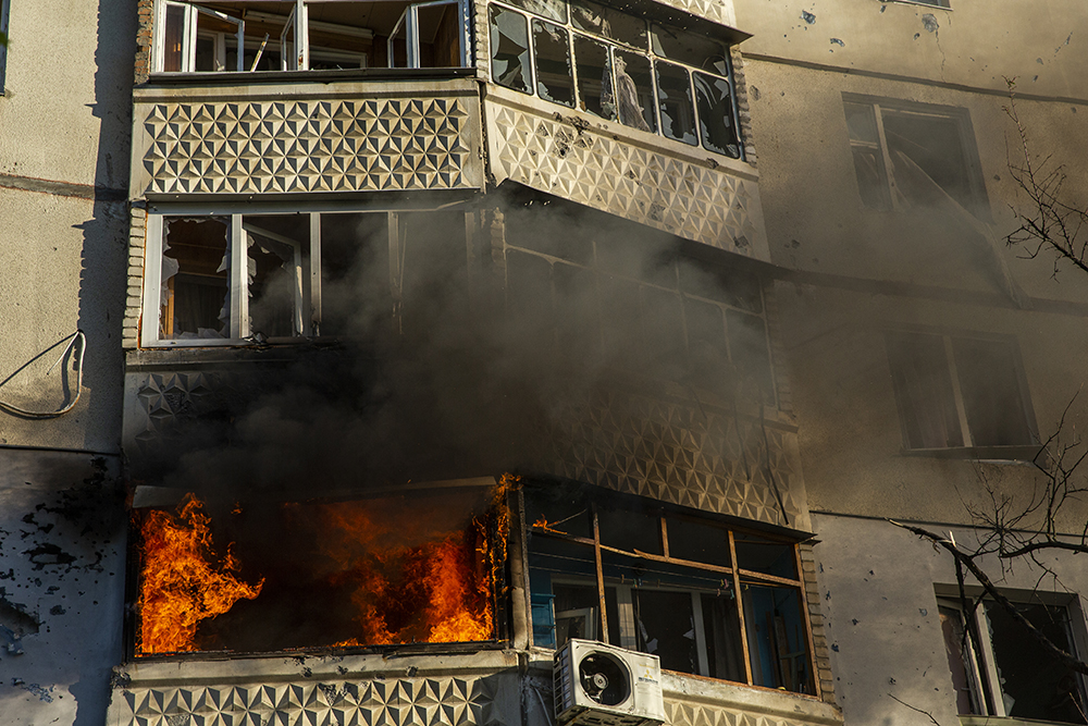 Home burning in Saltivka